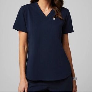 Fabletics scrubs women’s Vital 1 pocket scrub top in Navy Blue size Large